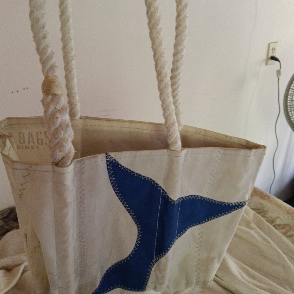 Seabag with matching clutch and tags.